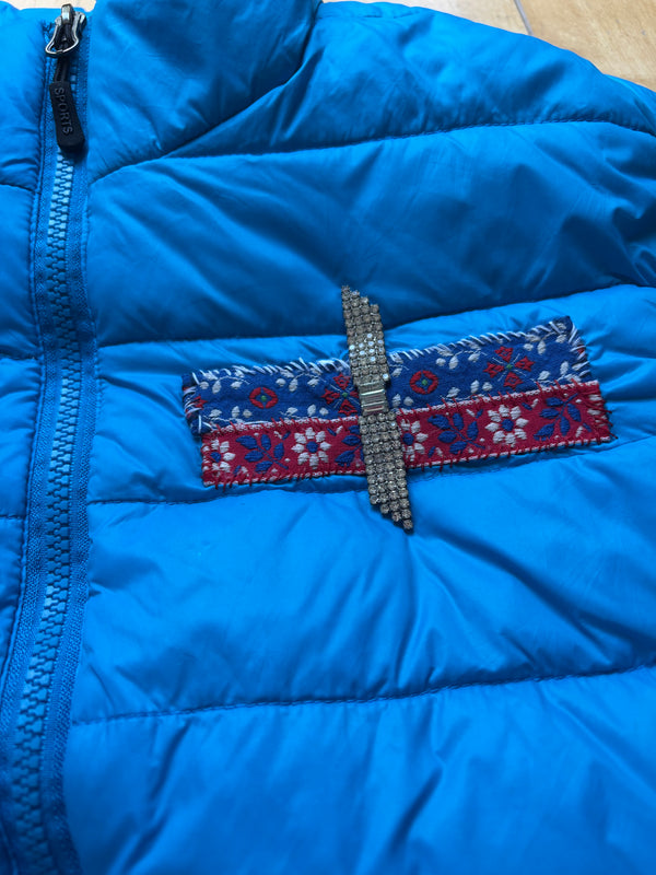 Microfeminism Corporate Puffer Vest in Royal Blue