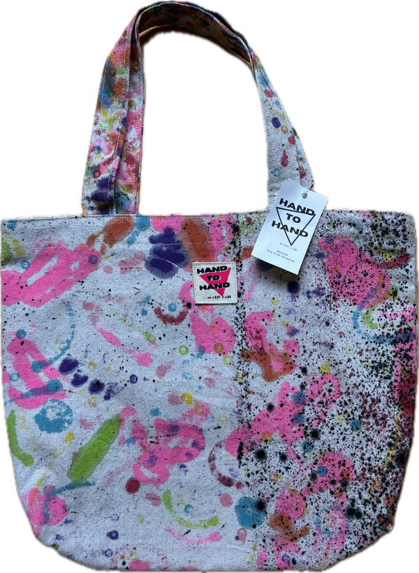 Hand 2 Hand Tote Bag with Black Splatter by Leif J. Lee