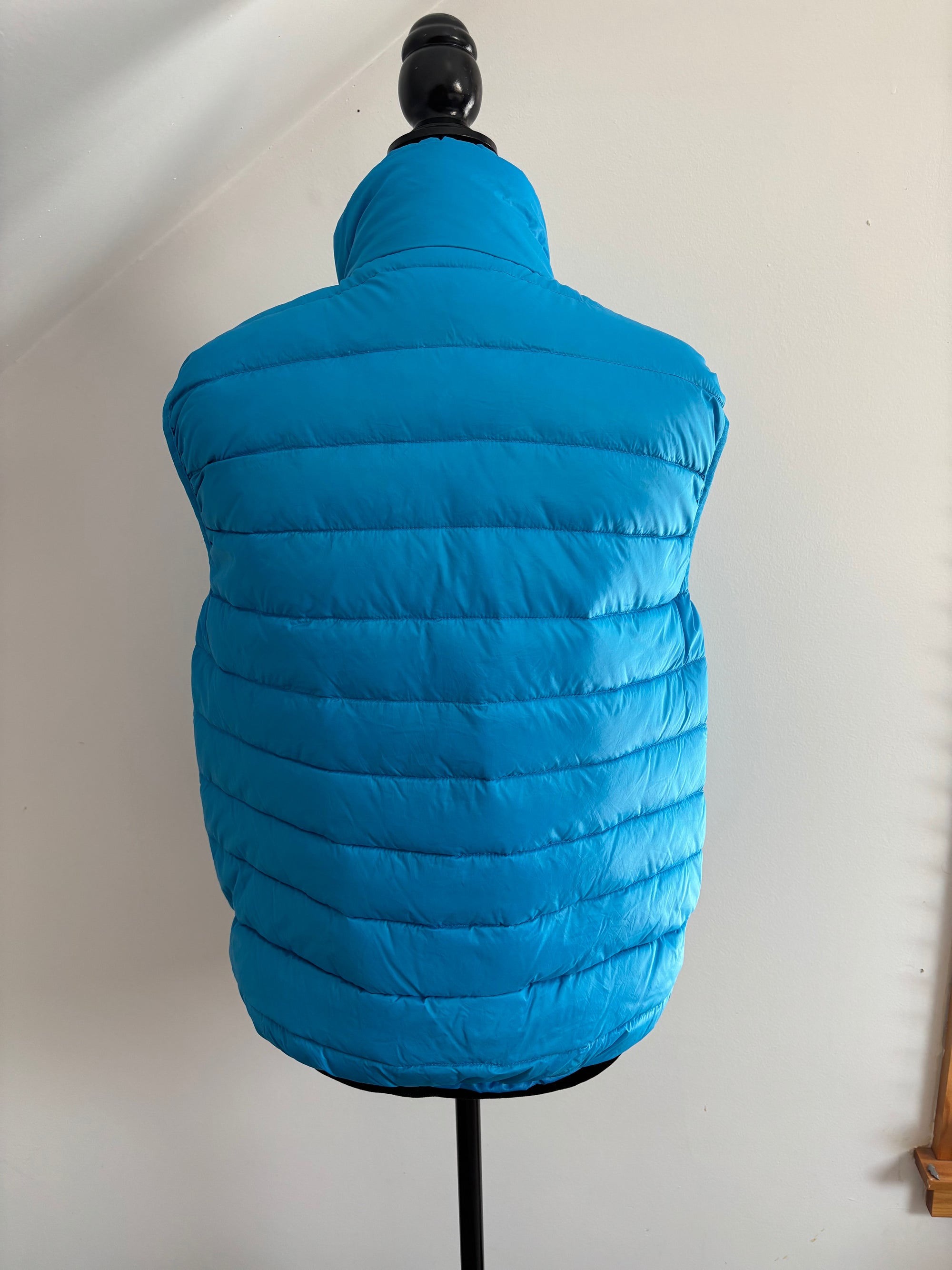 Microfeminism Corporate Puffer Vest in Royal Blue