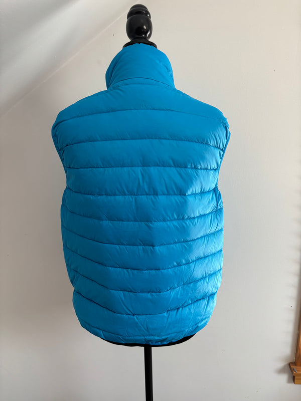 Microfeminism Corporate Puffer Vest in Royal Blue