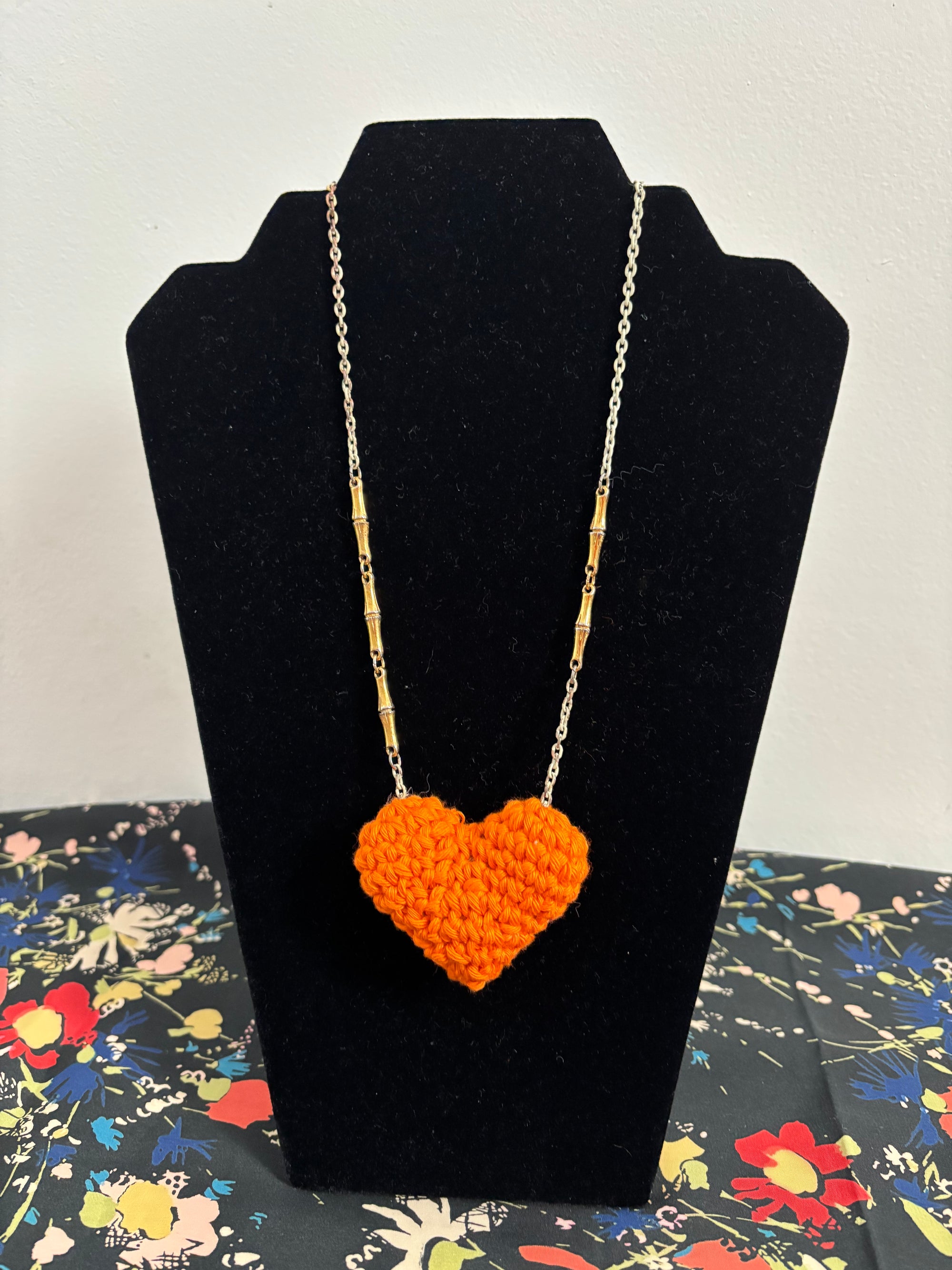 Orange crochet heart on upcycled chain necklace